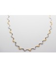 Collar en Oro Blanco y Amarillo de 18 Quilates