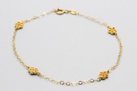 Pulsera Flores en Oro de 18 Quilates
