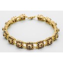 Pulsera en Oro de 18 Quilates con Granate