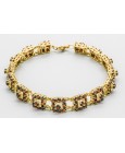 Pulsera en Oro de 18 Quilates con Granate