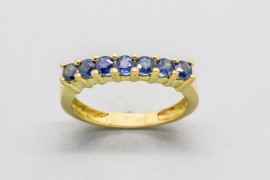 18Kt Yellow Gold Eternity Ring Decorated with Blue Sapphire