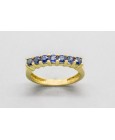 18Kt Yellow Gold Eternity Ring Decorated with Blue Sapphire