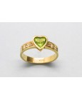 Anillo en Oro de 18Kt con un Centro de Esmeralda y Diamante