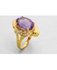 Anillo en Oro de 18Kt con Centro de Amatista y Diamantes