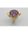Anillo en Oro de 18Kt con Centro de Amatista y Diamantes