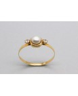 Anillo en oro de 18 Quilates con Centro de Perla y Circonita