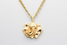 18Kt Gold Elephant Head Pendant Decorated with Rubies